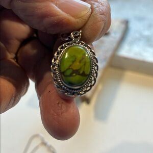 Beautiful copper turquoise set in 925 silver and a 925 silver chain